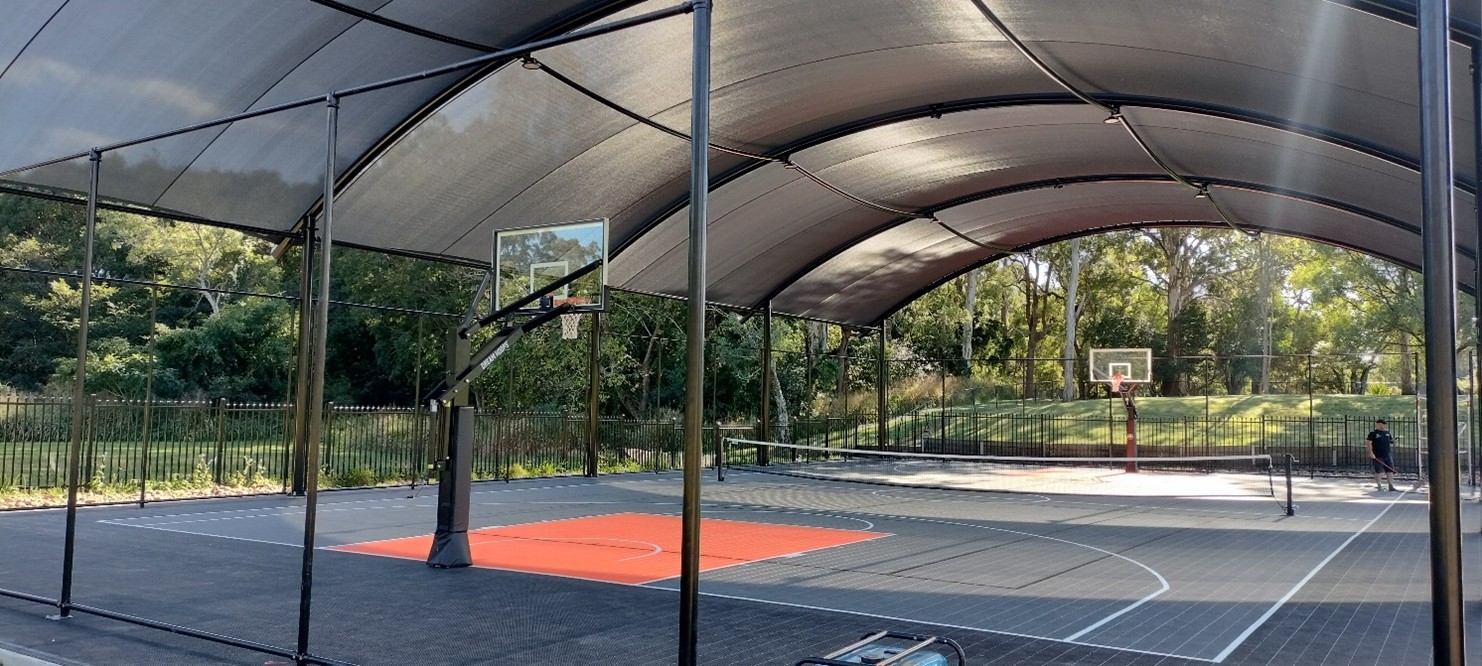 Basketball court shade structure designed and installed by Versatile Structures